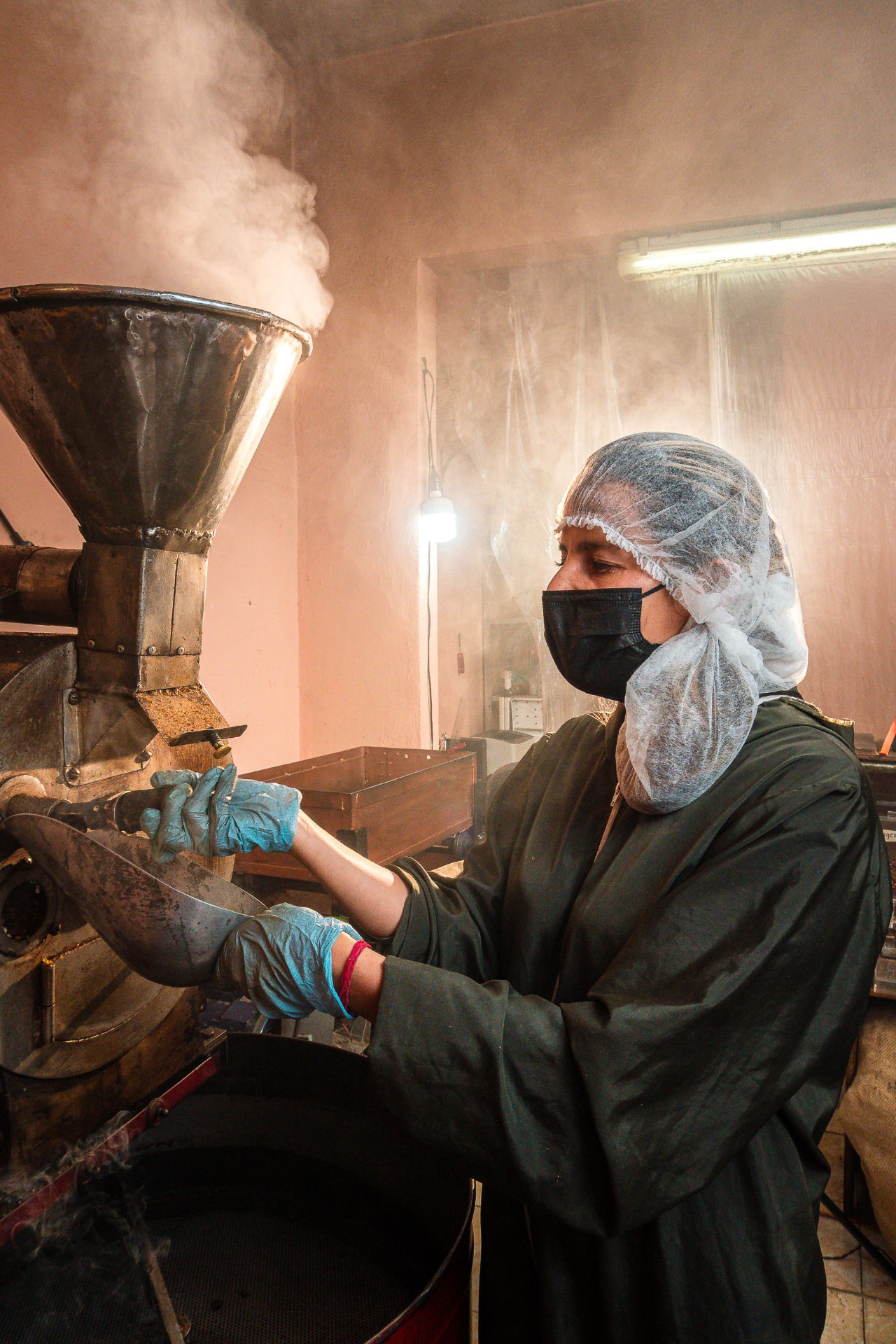 A roaster concentrating at the roastery